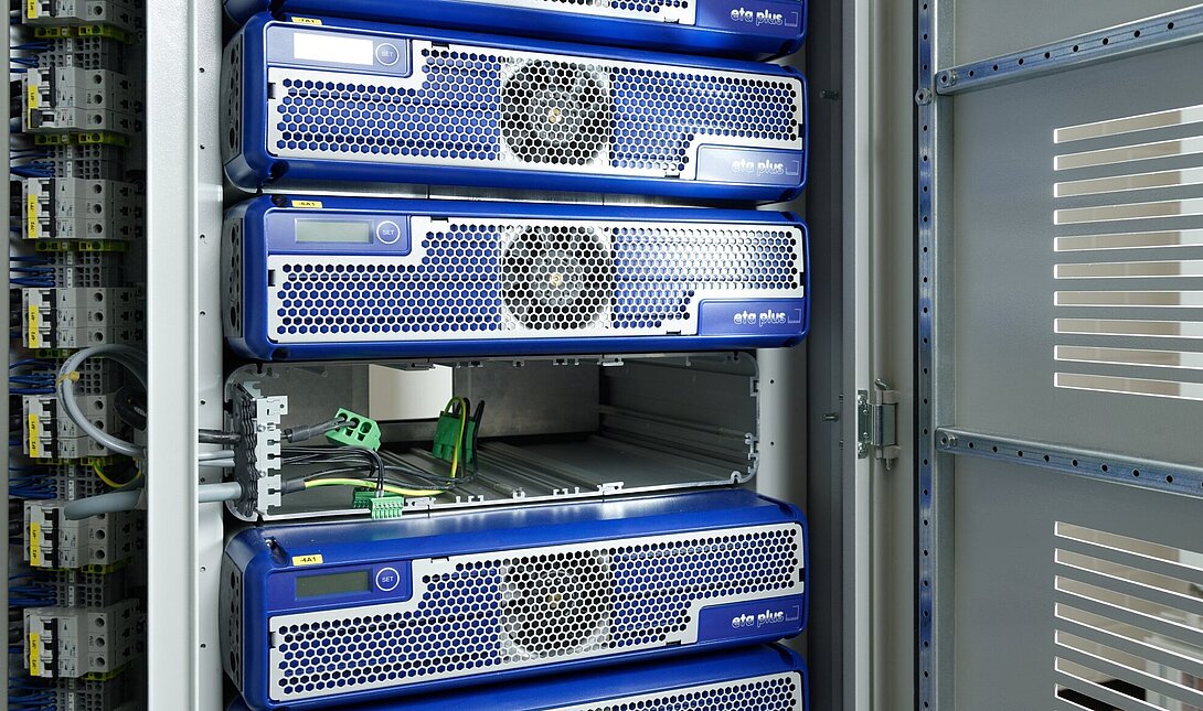 open control cabinet with several electronic ballasts
